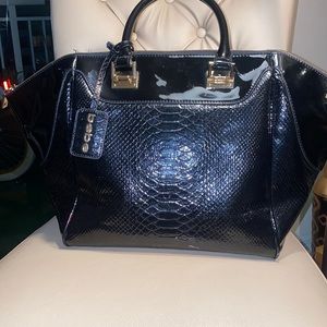 Black bag. Perfect condition. Ready to go.